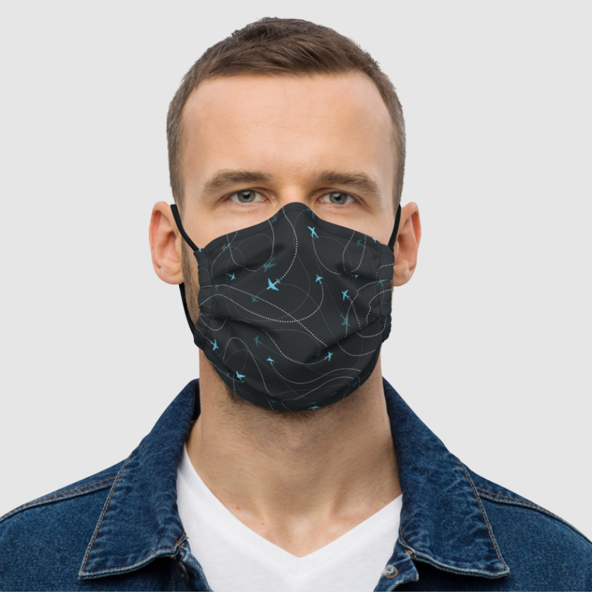 Black facemask with small blue airplanes 